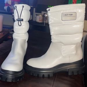 Brand new / no tags Calvin Klein boots.
